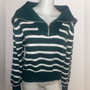En crème Women’s size M striped sweater